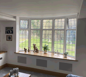 concealed home cinema in living room showing screen hiding