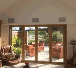 concealed home cinema in infront of bifold doors