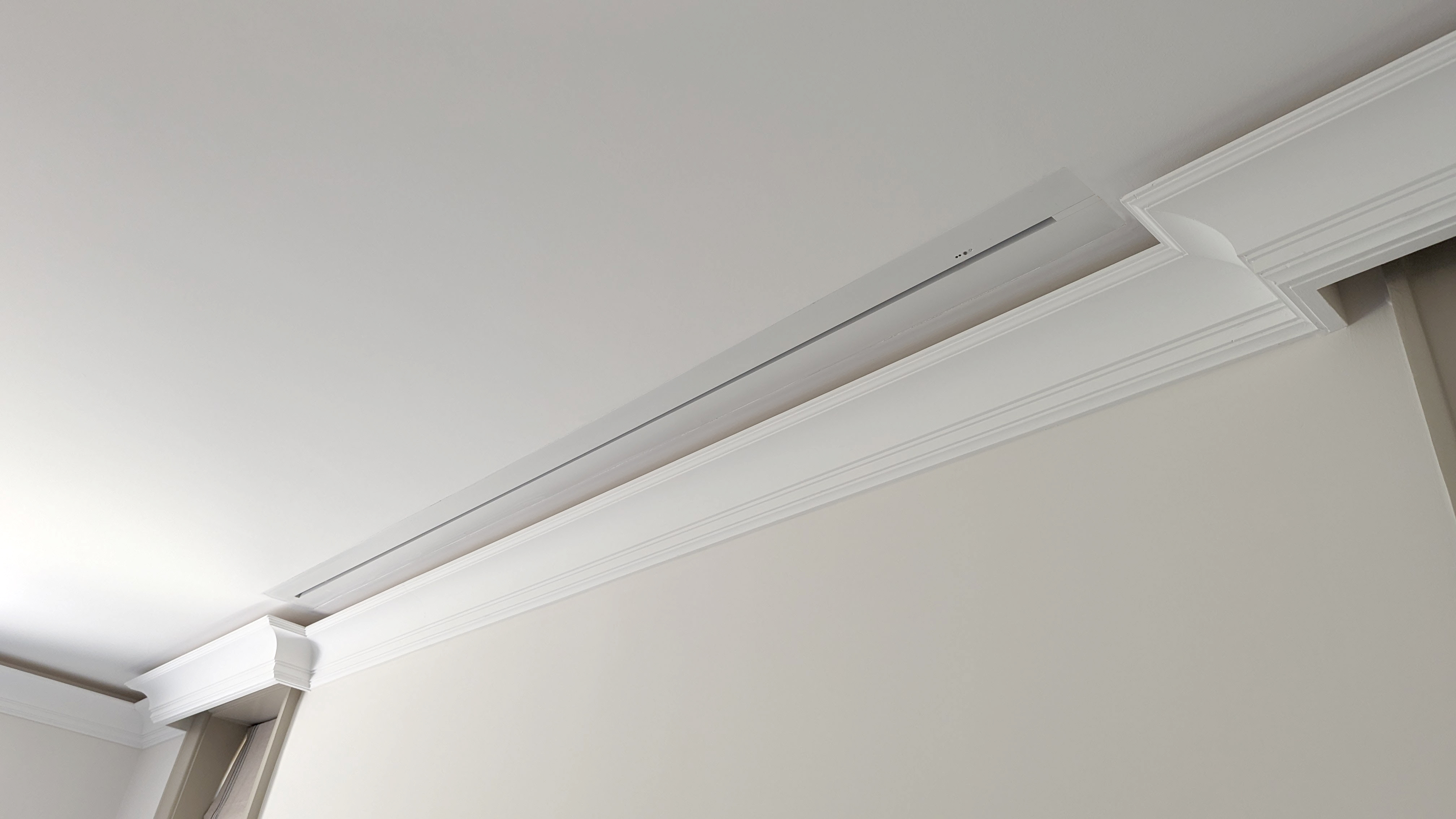 Flush projector screen in ceiling